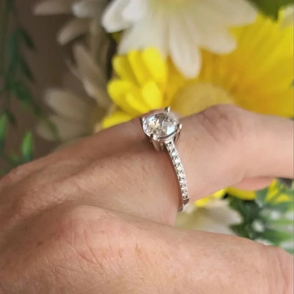 Genuine Moissanite Ring Platinum Over 925 Sterling Silver.
